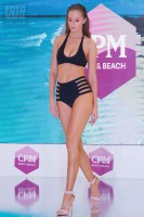 Модель в купальнике на показе CPM 2018