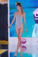Модель в купальнике на выставке CPM 2018