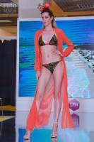 Модель в купальнике на показе CPM 2018