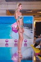Девушка в купальнике на выставке CPM 2018