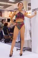 Модель бикини на выставке CPM 2018