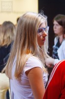 Девушка в мини на выставке