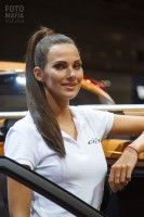 Модель в шортиках на выставке ММАС 2016