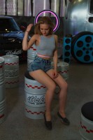 Фотоохота на девушку на выставке тюнинга