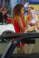 Модель в мини на выставке Auto Tuning Show 2018