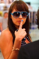 x'show 2011 девушка брюнетка голубой маникюр и очки