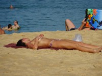 Фотоохота на девушку на пляже